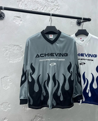 “Achieving” Flame Graphic Long Sleeve Jersey