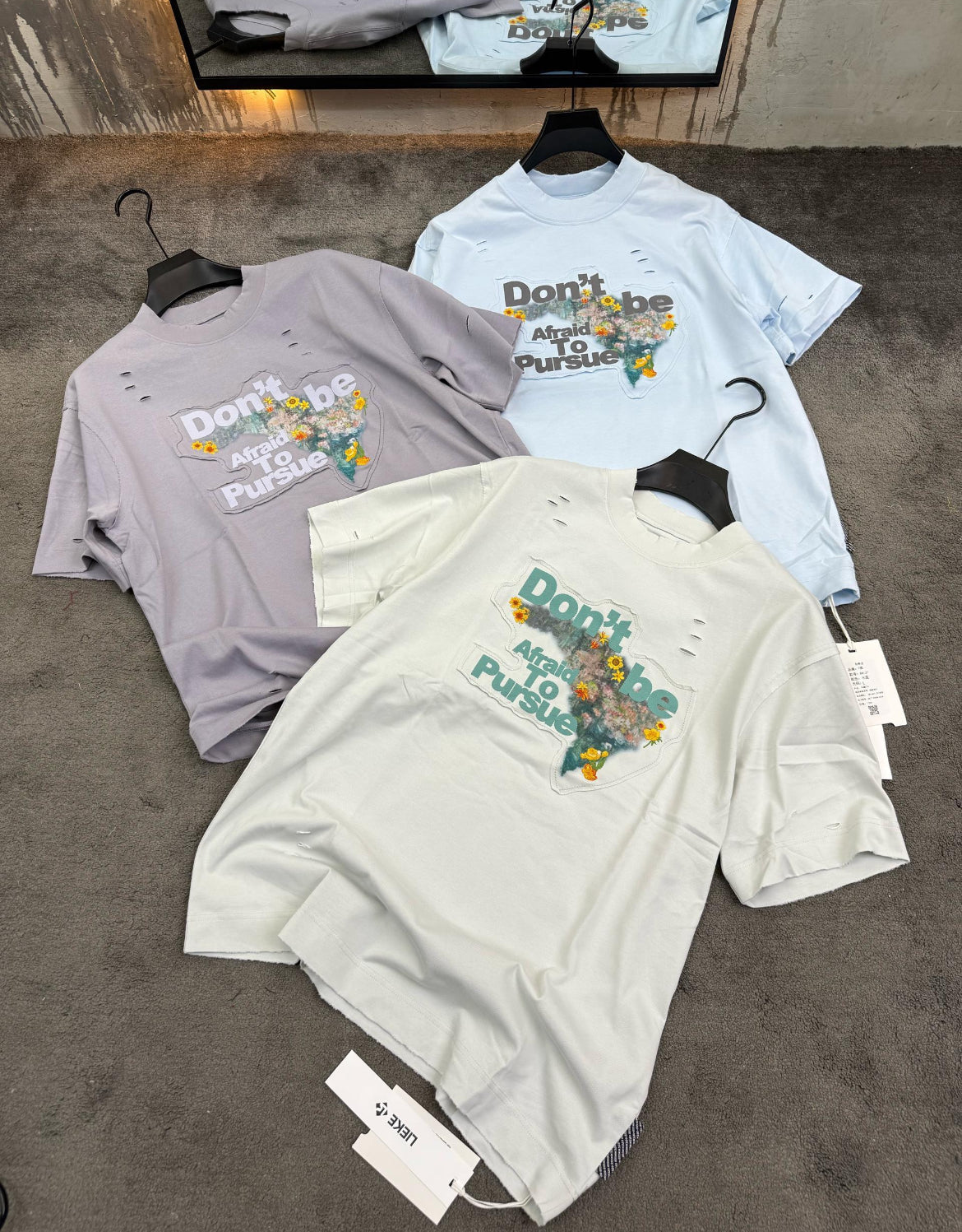 Pursuit Floral Distressed Tee